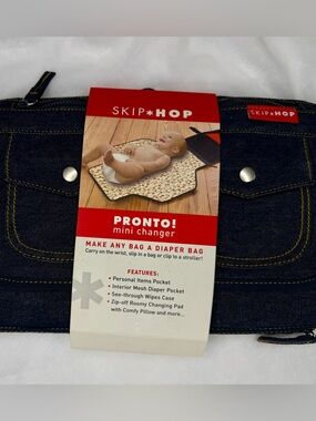 Skip Hop Mini Changer Navy Denim with floral pattern